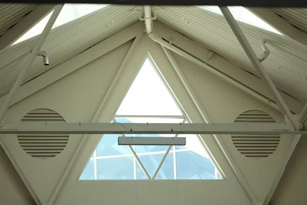 Attic ventilation setup for a whole house fan system.